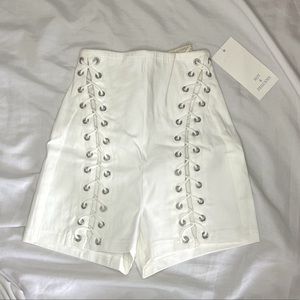 Hot & delicious white shorts brand new, size small